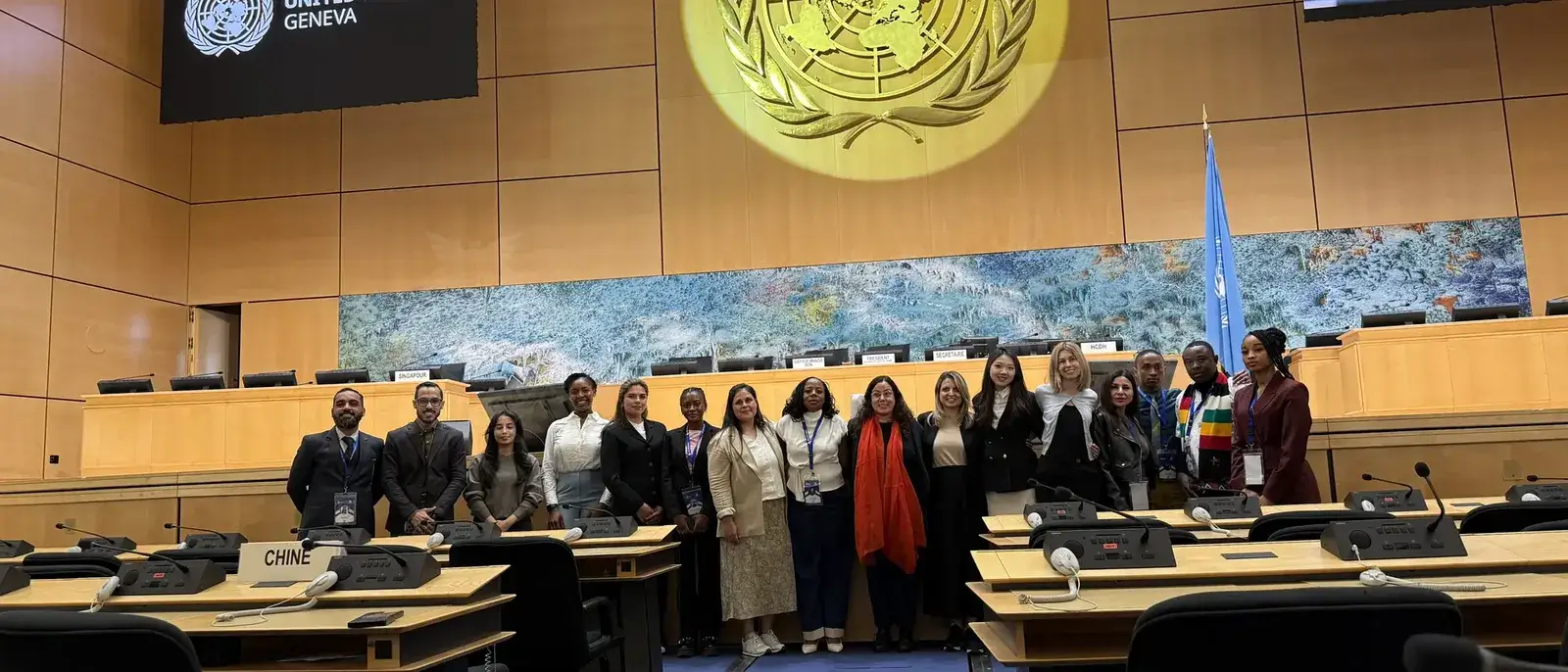 Best Diplomats delegates on the stage of a United Nations assembly room in Geneva