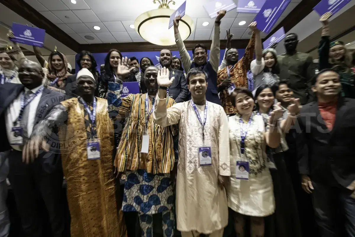Delegates cheering at the end of a session